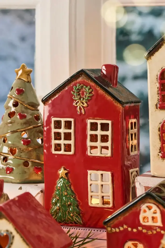 Casa Portavela con Abeto Roja