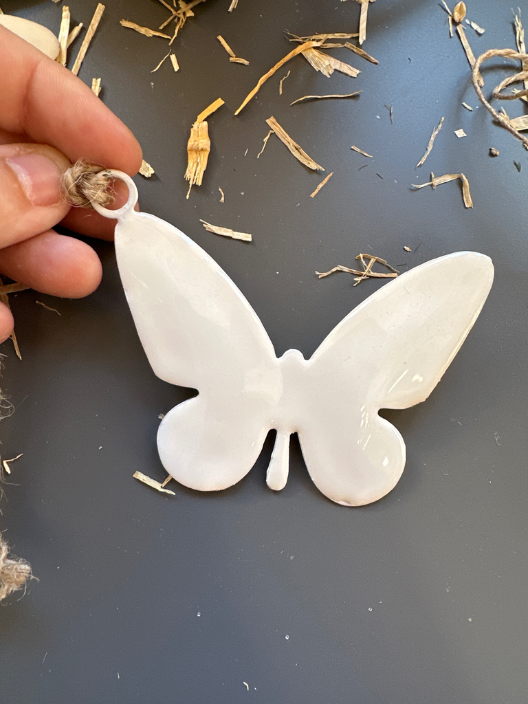 mariposa blanca colgar