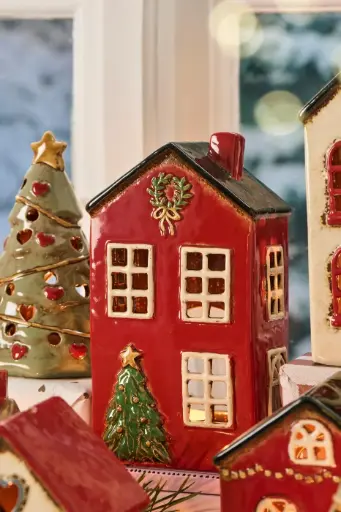 Casa Portavela con Abeto Roja